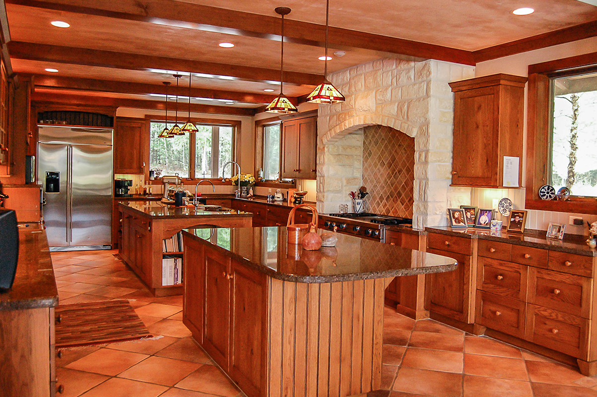 two islands in farmhouse kitchen