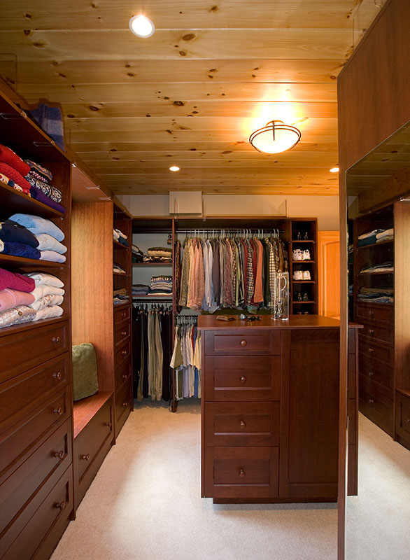 center storage for small items in master walk in closet