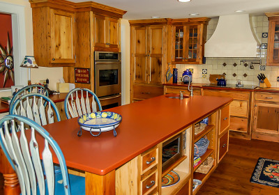 country kitchen with vibrant color scheme by designs for living vt