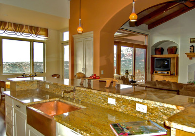 limestone counter and generous copper center sink