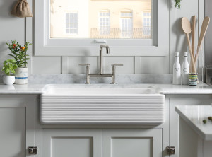 Apron sink with transitional styling.